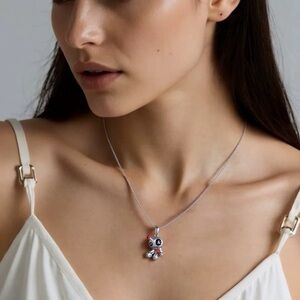 Anthropologie Silver-Tone Panda Pendant Necklace in Black and Red